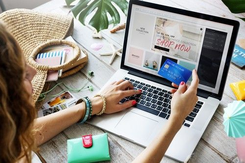 She used her laptop and card for e-commerce and online shopping.